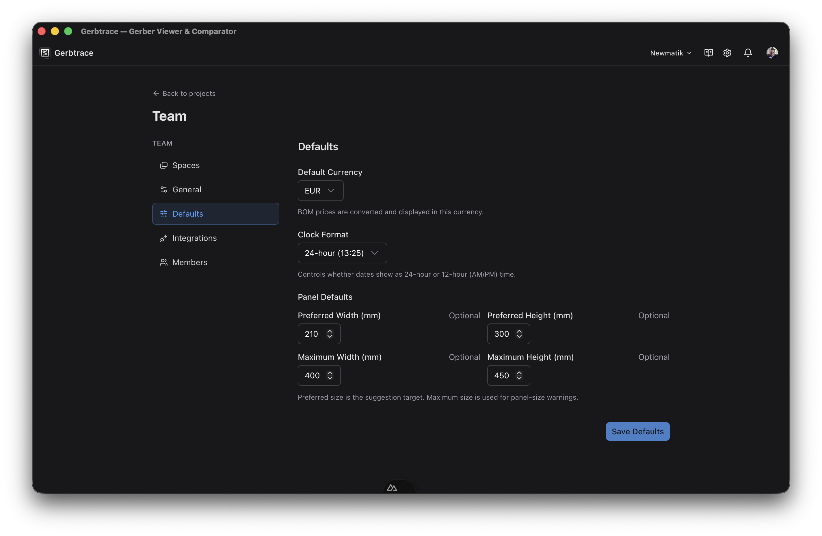Team Settings Defaults tab showing currency, time format, and panel defaults